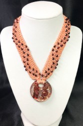 peach necklace website